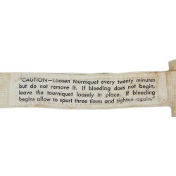 Garrot, US Army, NOVELTY PRODUCTS CO., U.S.N. Stock No. 2-1310, dans sa boîte